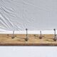 Teak coat rack with 10 double cast iron hooks