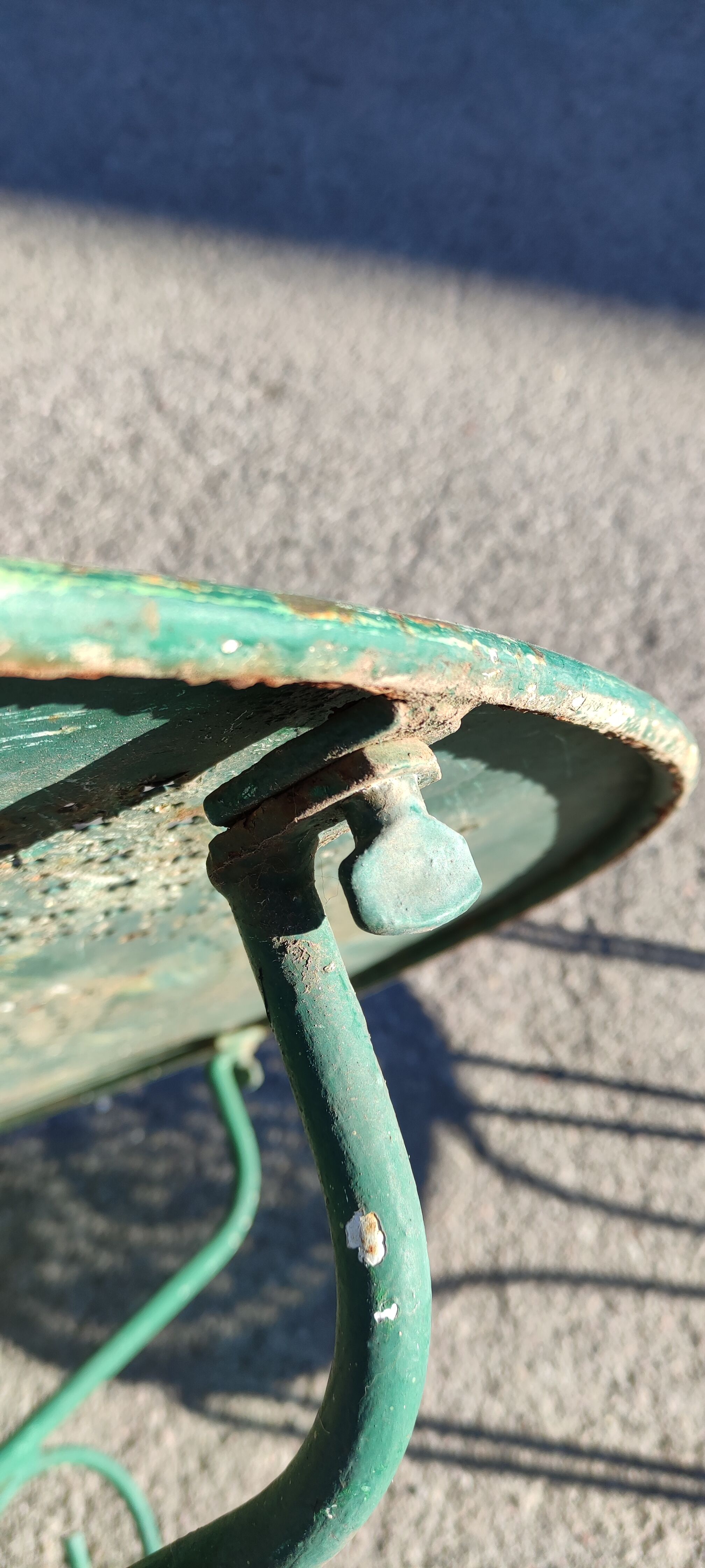 Garden table, two armchairs and a metal chair
