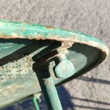 Garden table, two armchairs and a metal chair