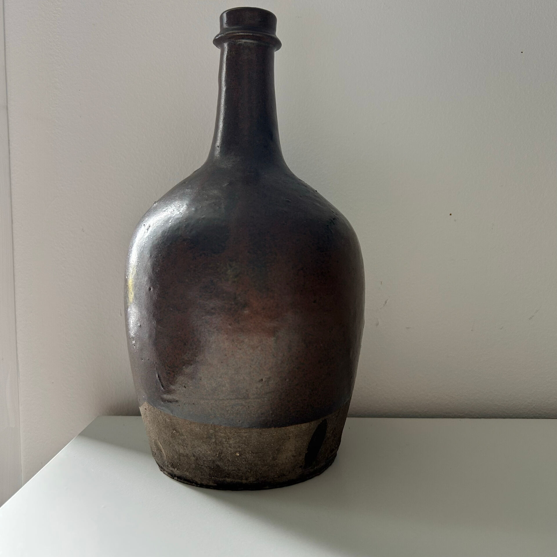 Brown two-tone stoneware bottle