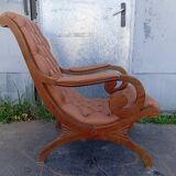 Chesterfield armchair in wood and leather