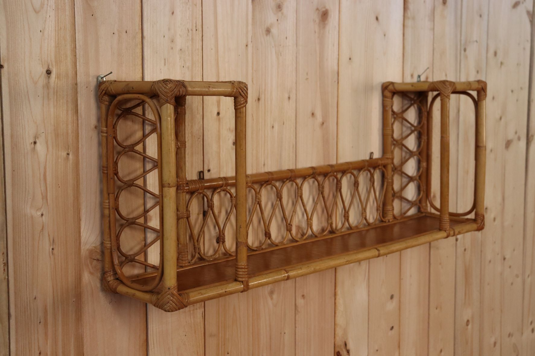 Rattan wall shelf