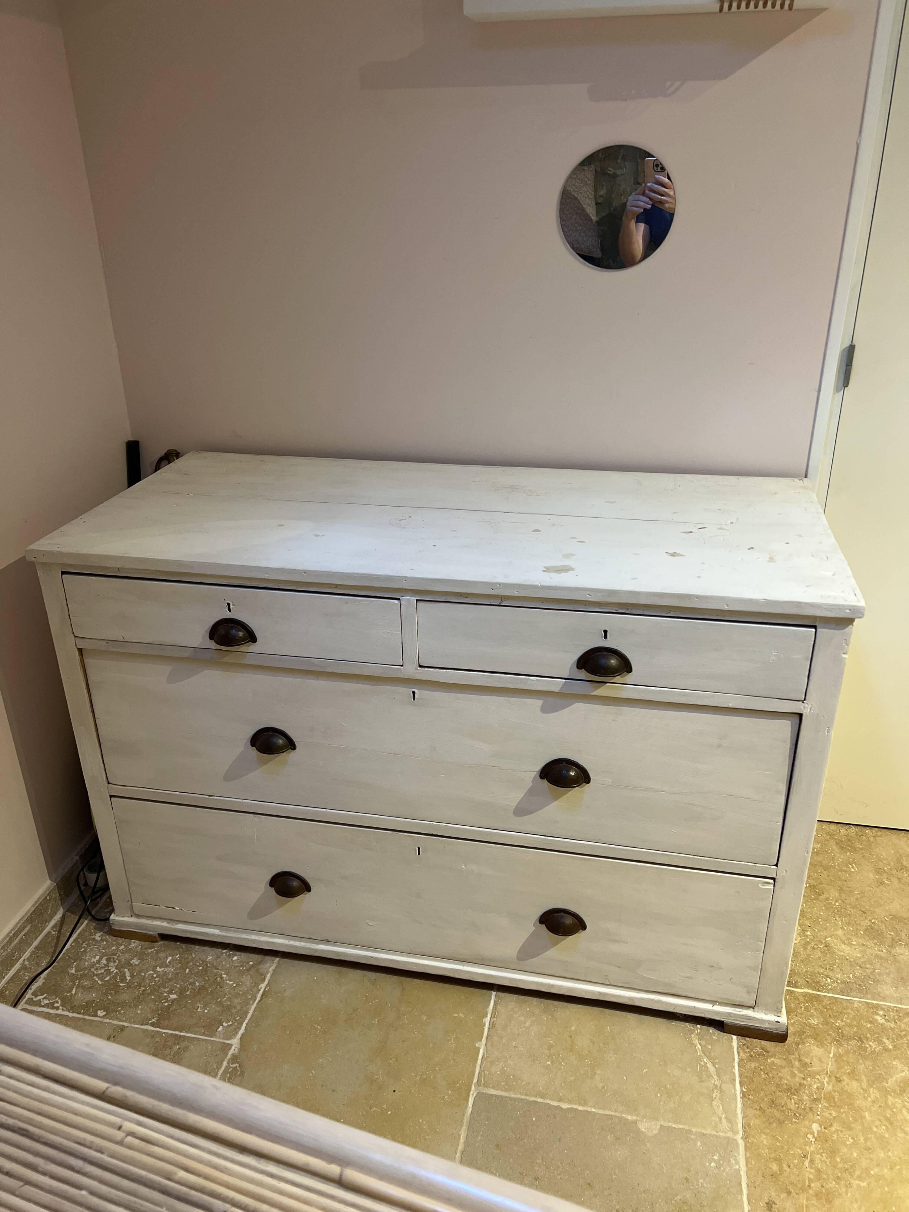 Sturdy antique sideboard with solid wood and drawers.