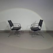 2 chaises pliantes en cuir chromé