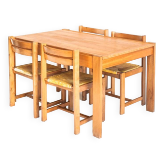 Extendable table and 4 chairs set with a rationalist design in solid elm wood. France, 70's