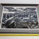 Offset edition in black and white "Genesis" after Sebastião Salgado, framed under glass, 30 x 38 cm