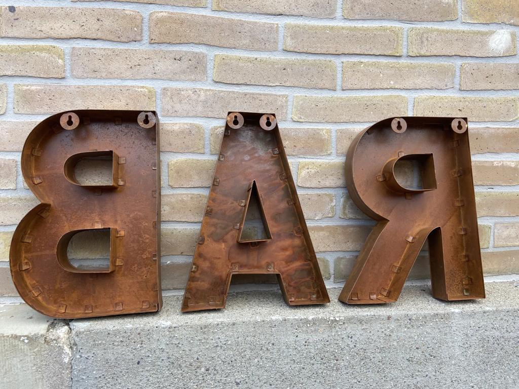 Bar sign in metal letters