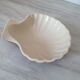Brown and white ceramic shell bowl