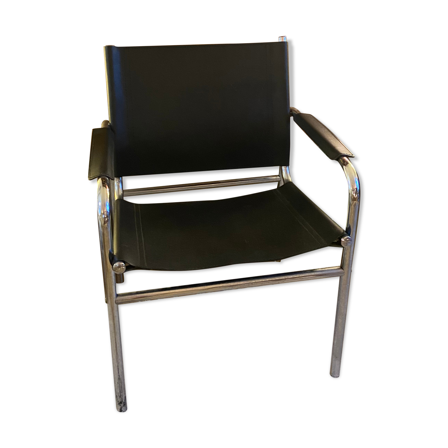 Tubular armchair and vintage skaï