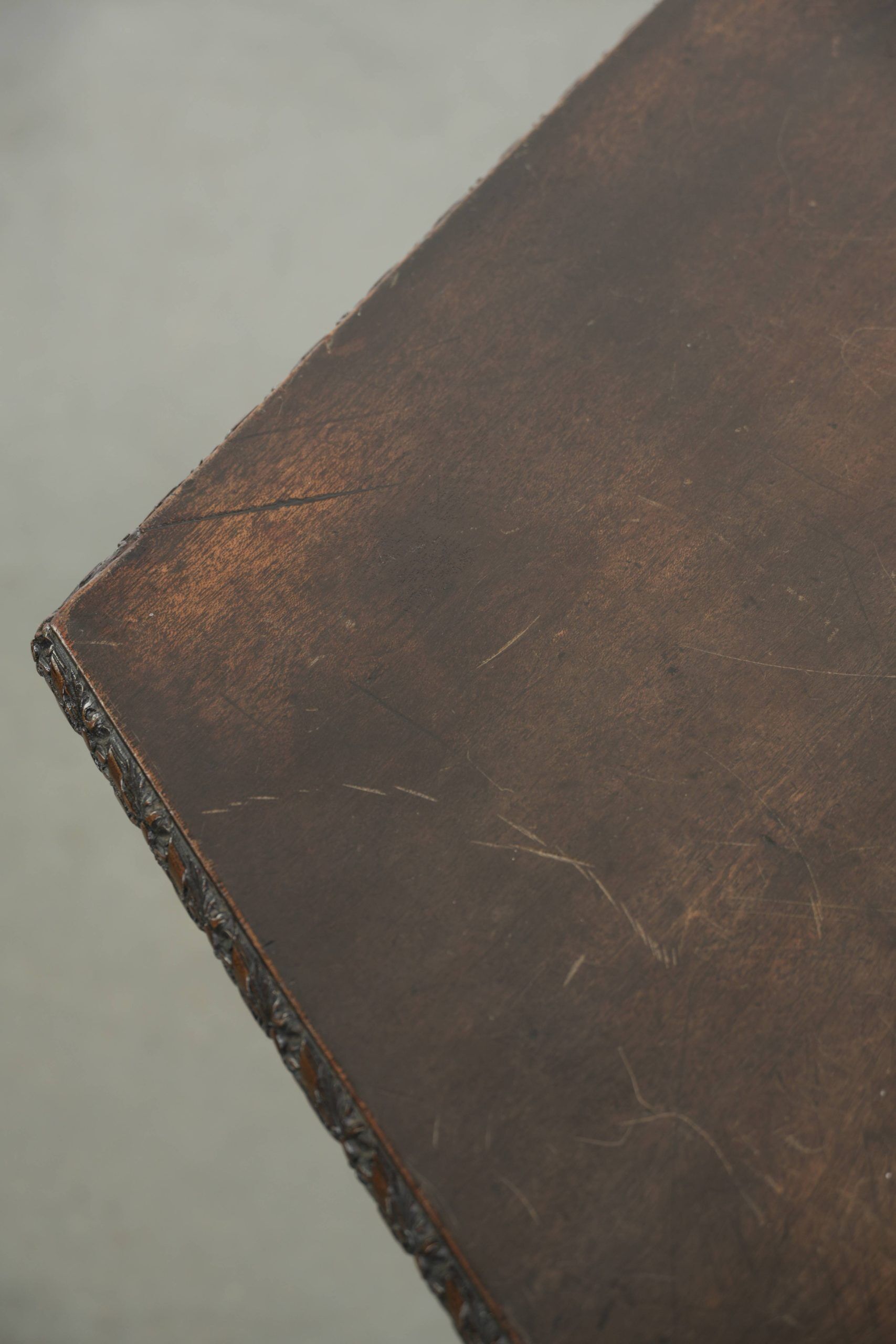 Antique wooden English rotating book table/side table from the 19th century