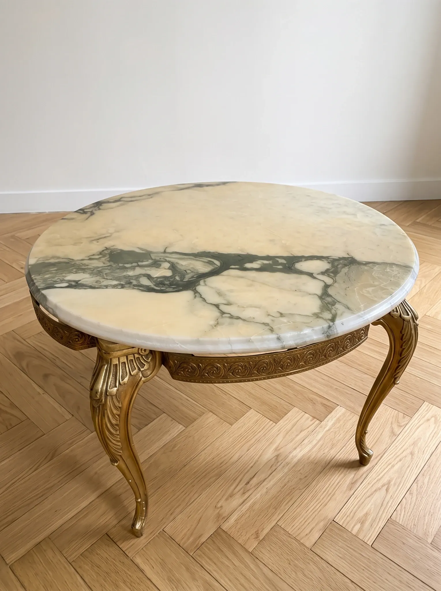 Baroque style coffee table with marble and gilded wood.