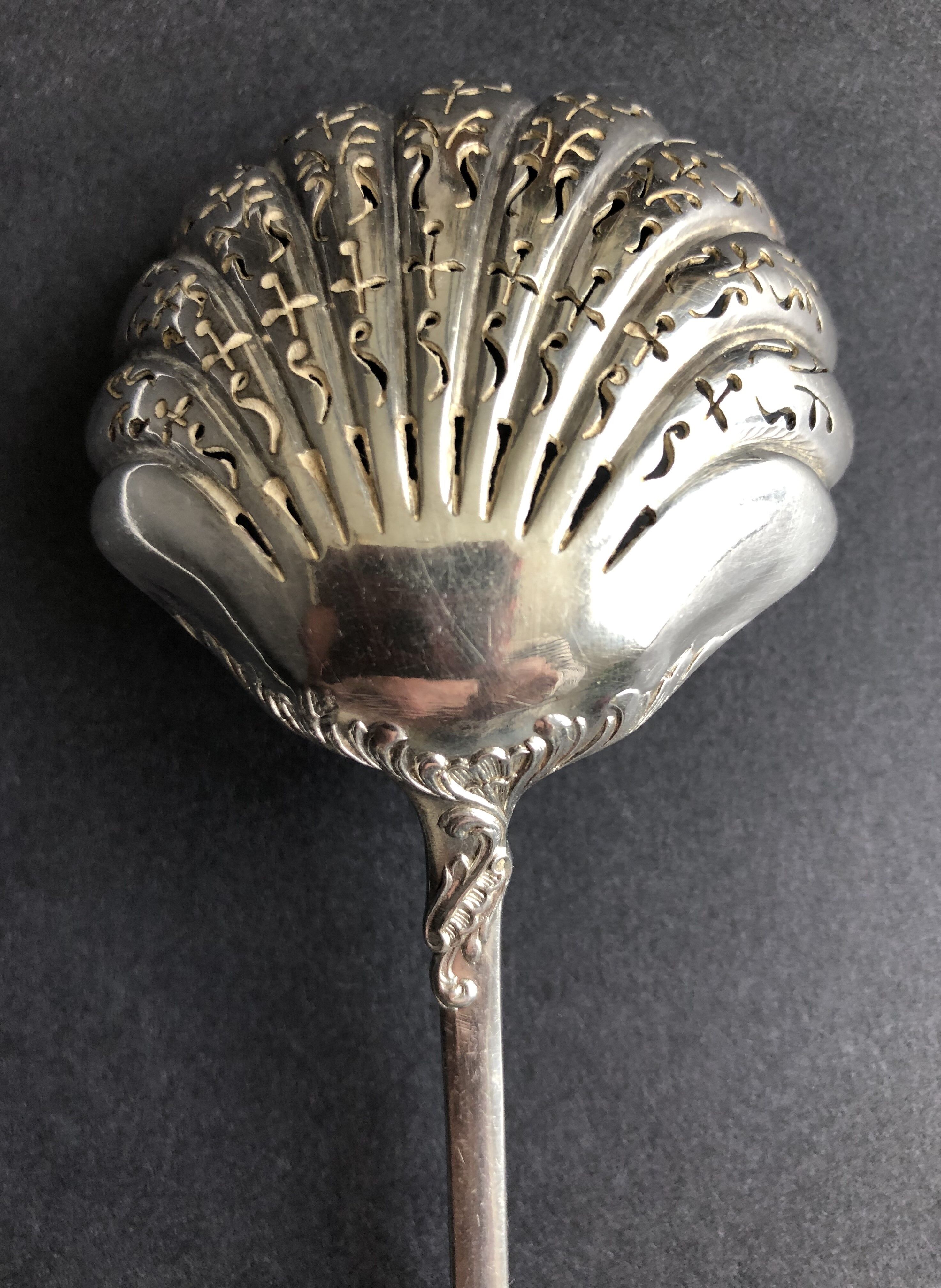 Silver sprinkling spoon