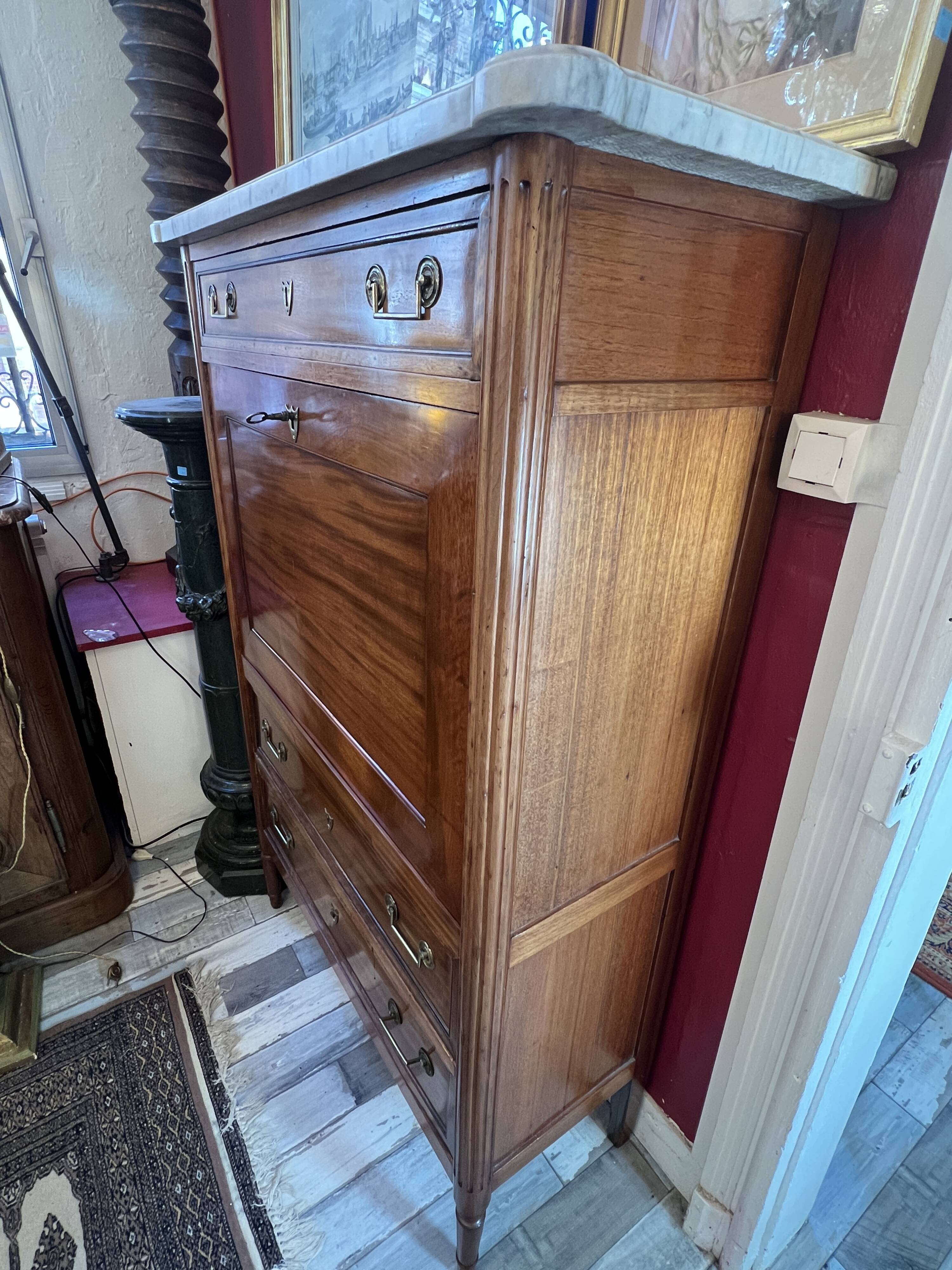 Louis XVI period mahogany secretary, white marble top, clover lock