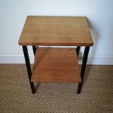 A pair of bedside tables