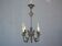 Lustre en métal argenté de style Louis XVI