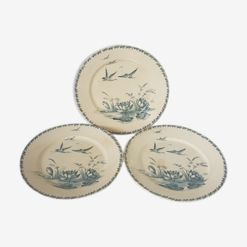 3 flat plates made of Badonviller earthenware model Nenuphar, iron earth
