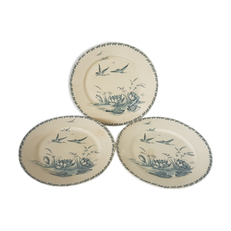 3 flat plates made of Badonviller earthenware model Nenuphar, iron earth