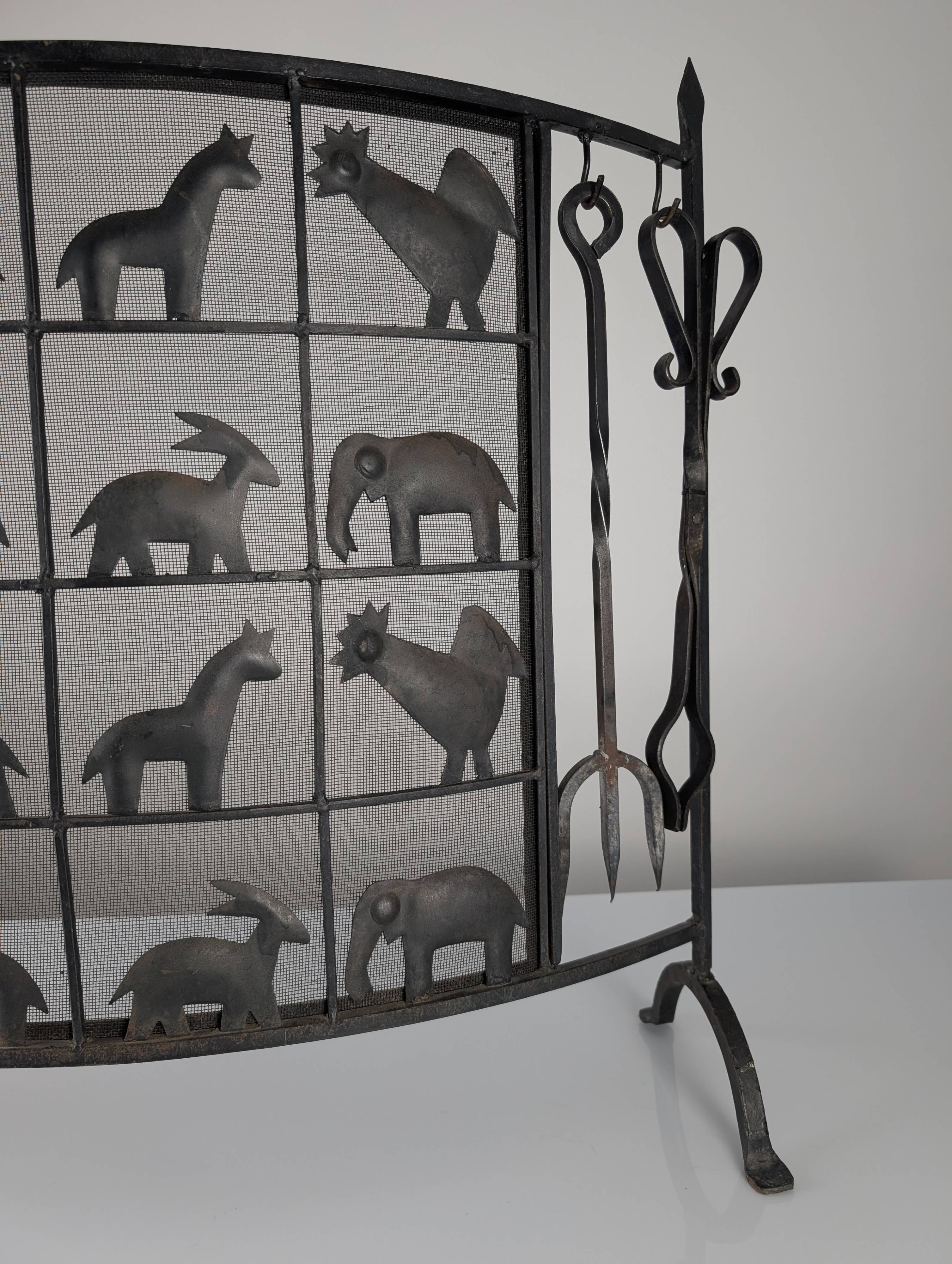 Pare-feu animalier en fer forgé, par Atelier Marolles, années 1950