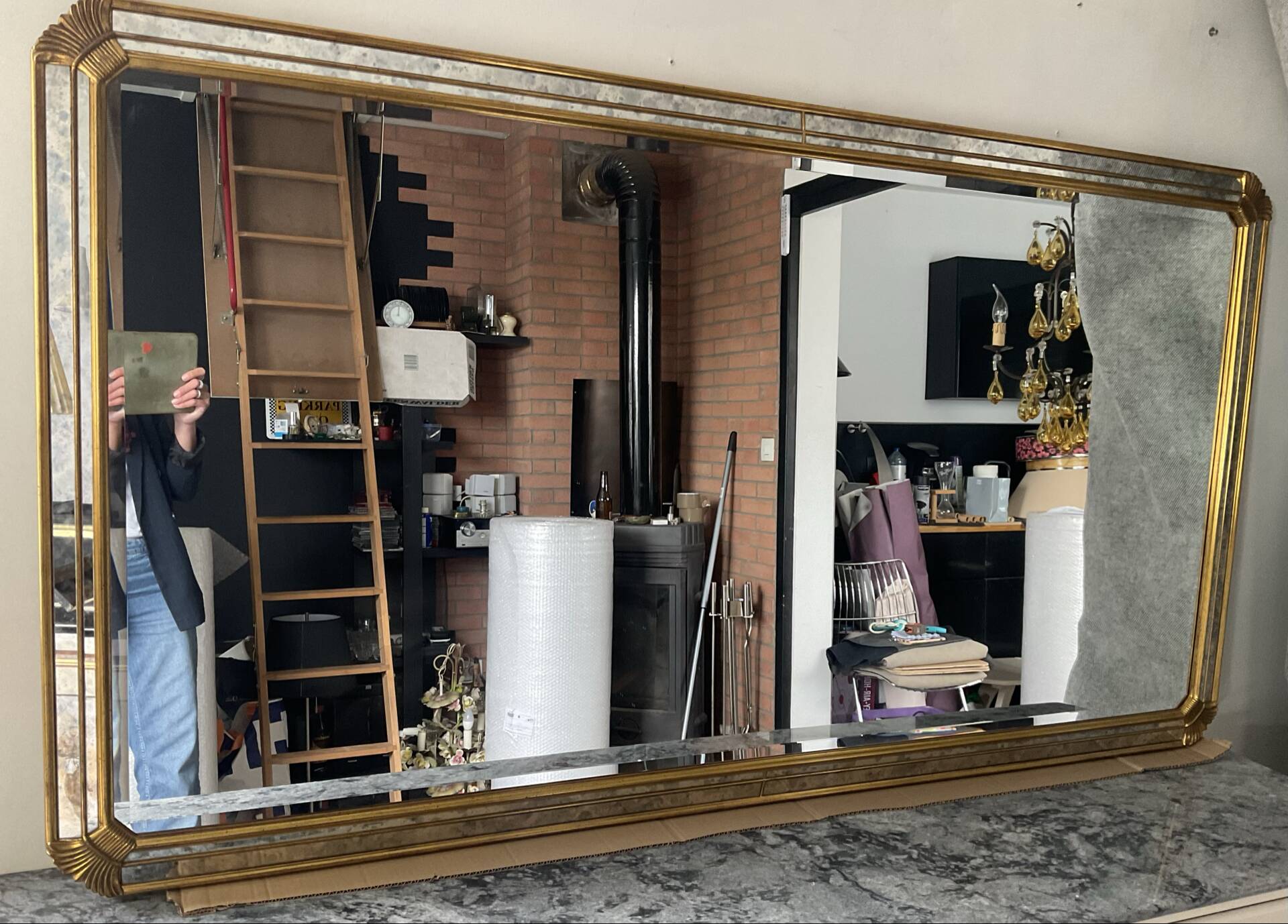 Large gold mirror by Deknudt with parcloses from the 1970s.