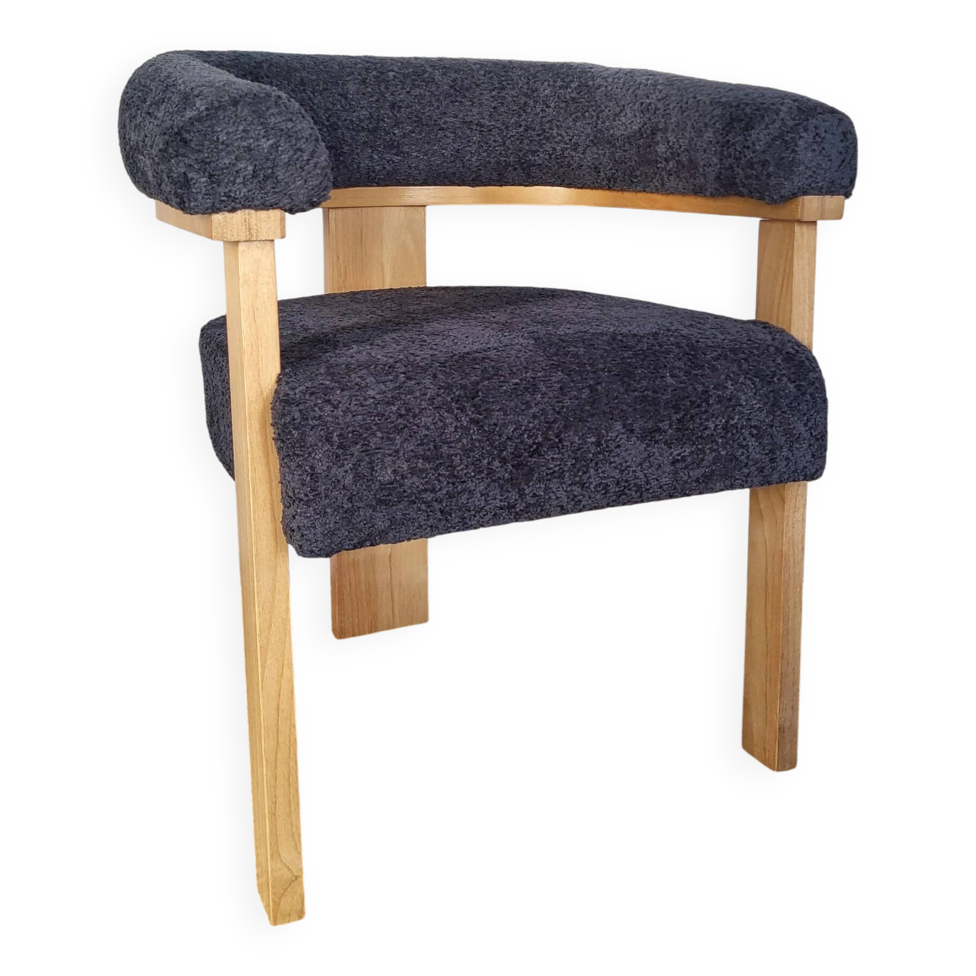 Contemporary armchair in wood and bouclé fabric