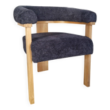 Contemporary armchair in wood and bouclé fabric