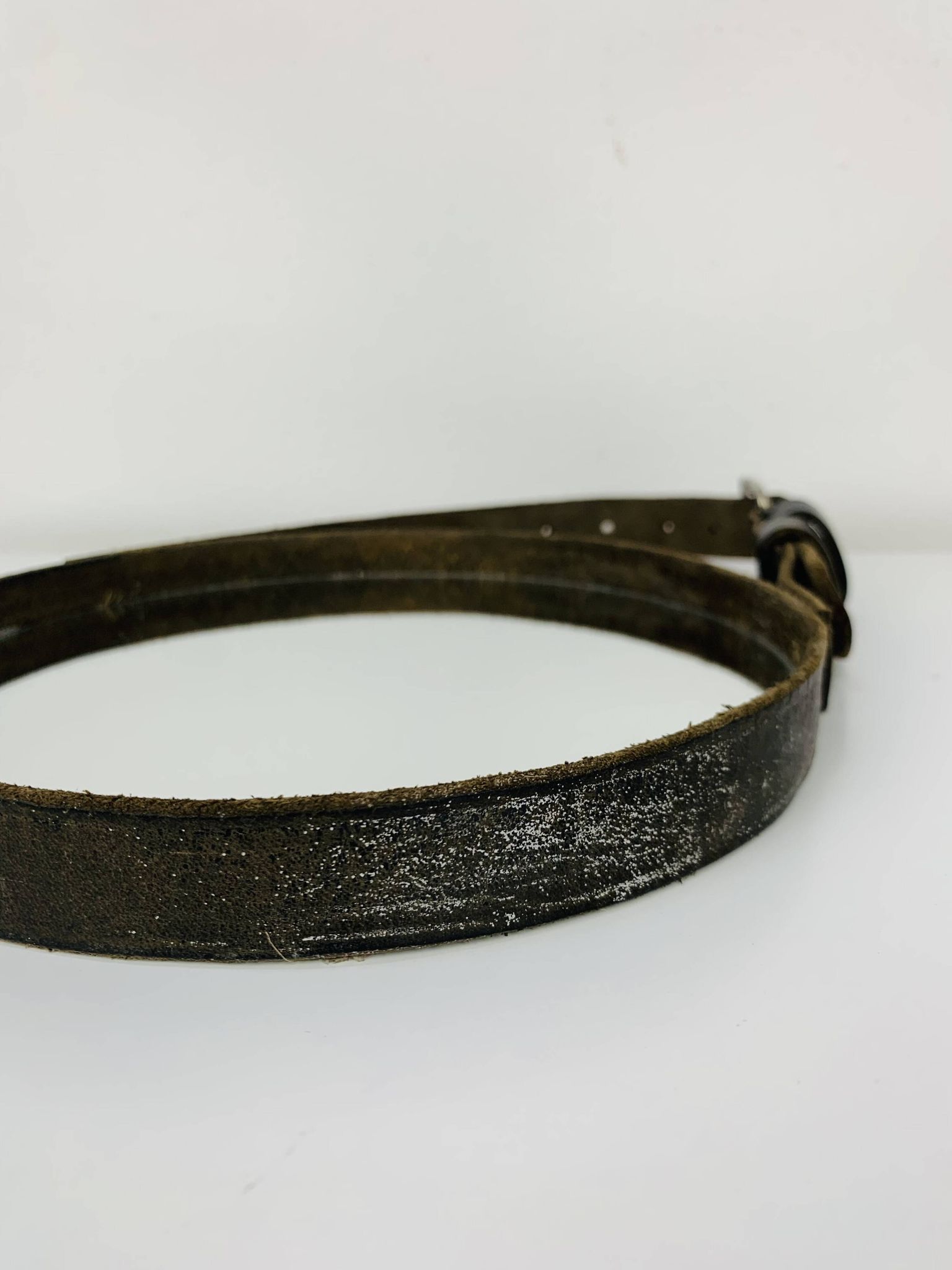 Mirror with handmade leather strapping