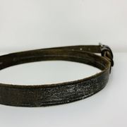 Mirror with handmade leather strapping