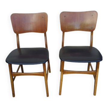Set of 2 vintage Scandinavian chairs in teak and black faux leather by Kofod-Larsen, Denmark, 1960s.