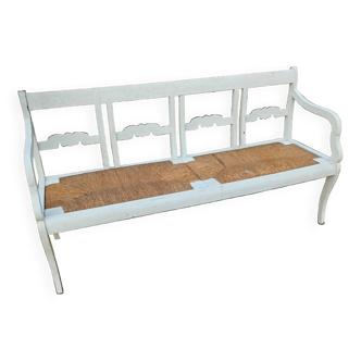 Wooden bench with straw pad