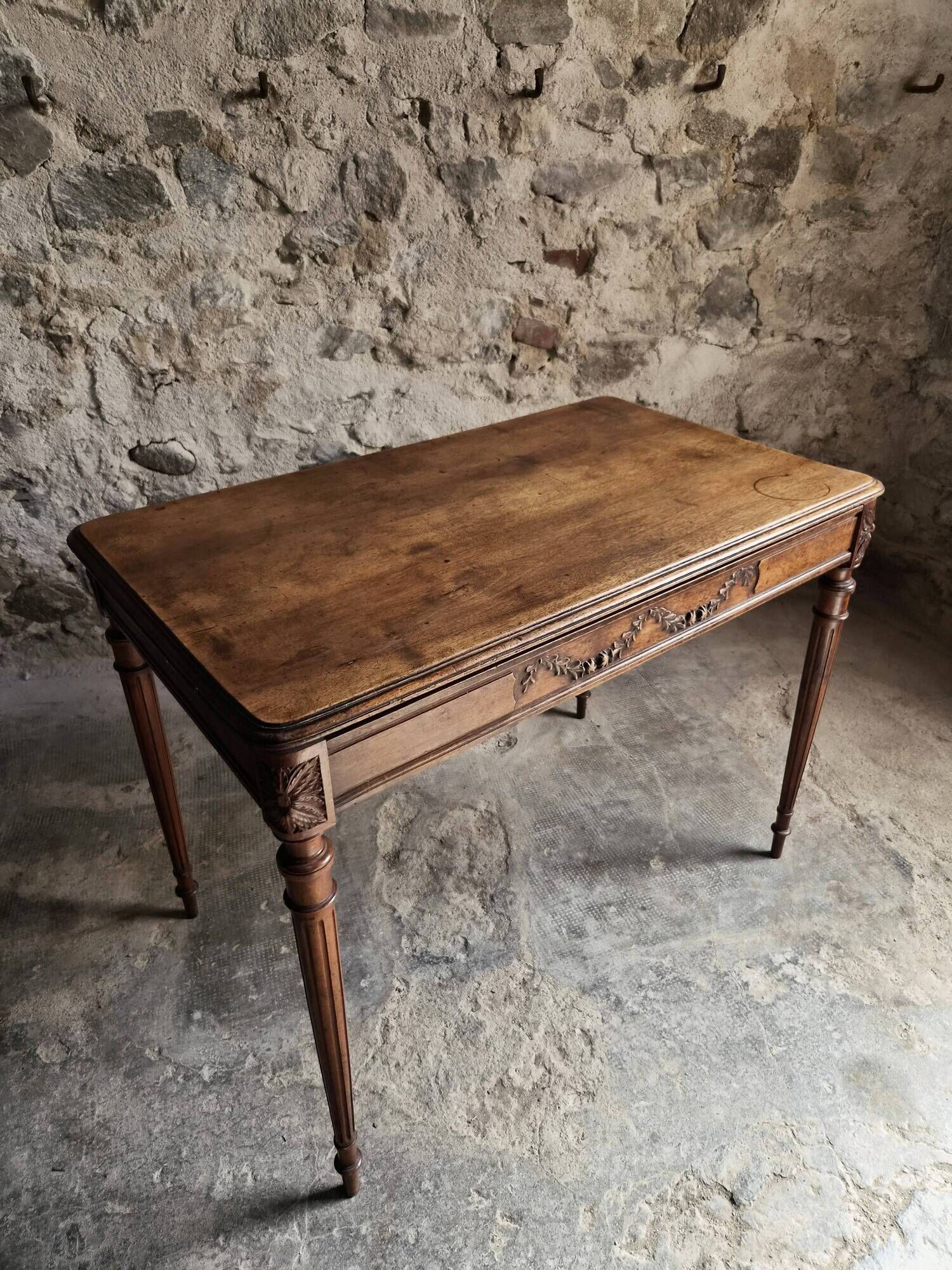 French antique writing desk in walnut, Louis XVI style, late 19th century, circa 1880–1900.