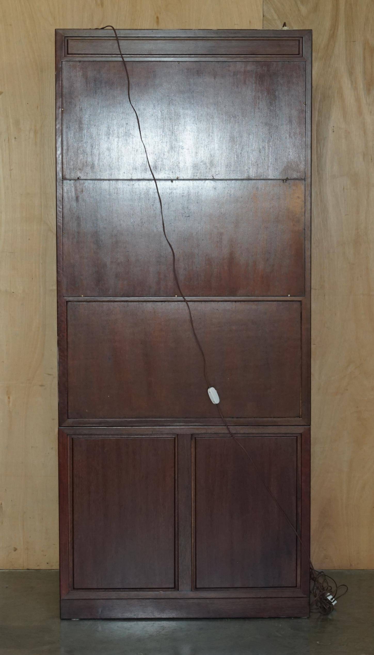 Set of three vintage hardwood military-style bookshelves.