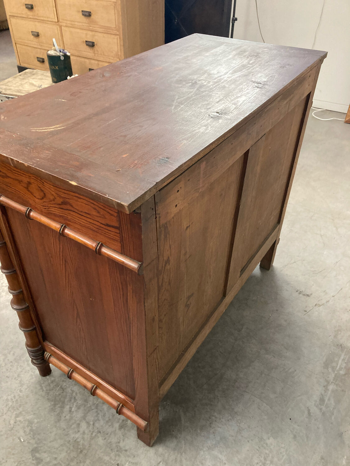 Old wooden chest of drawers imitation bamboo