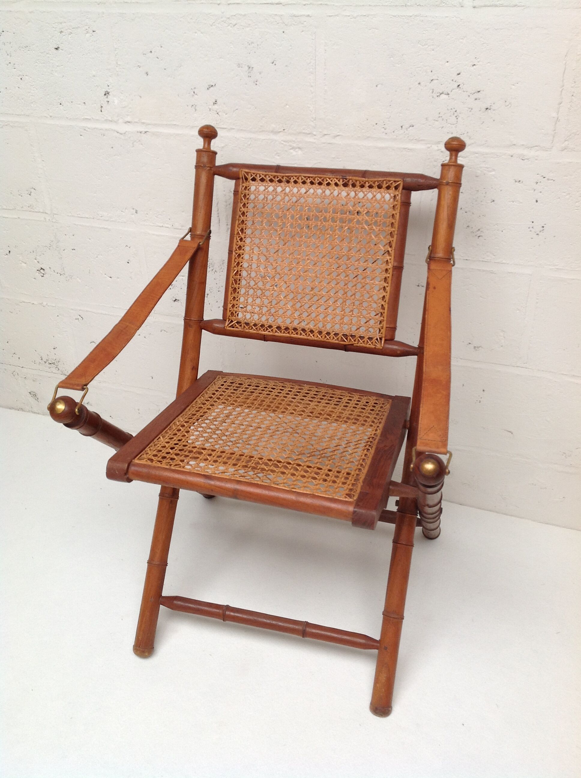 Bamboo folding chair and canning, leather and brass