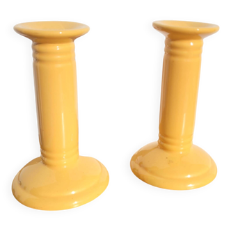 Pair of yellow ceramic candlesticks