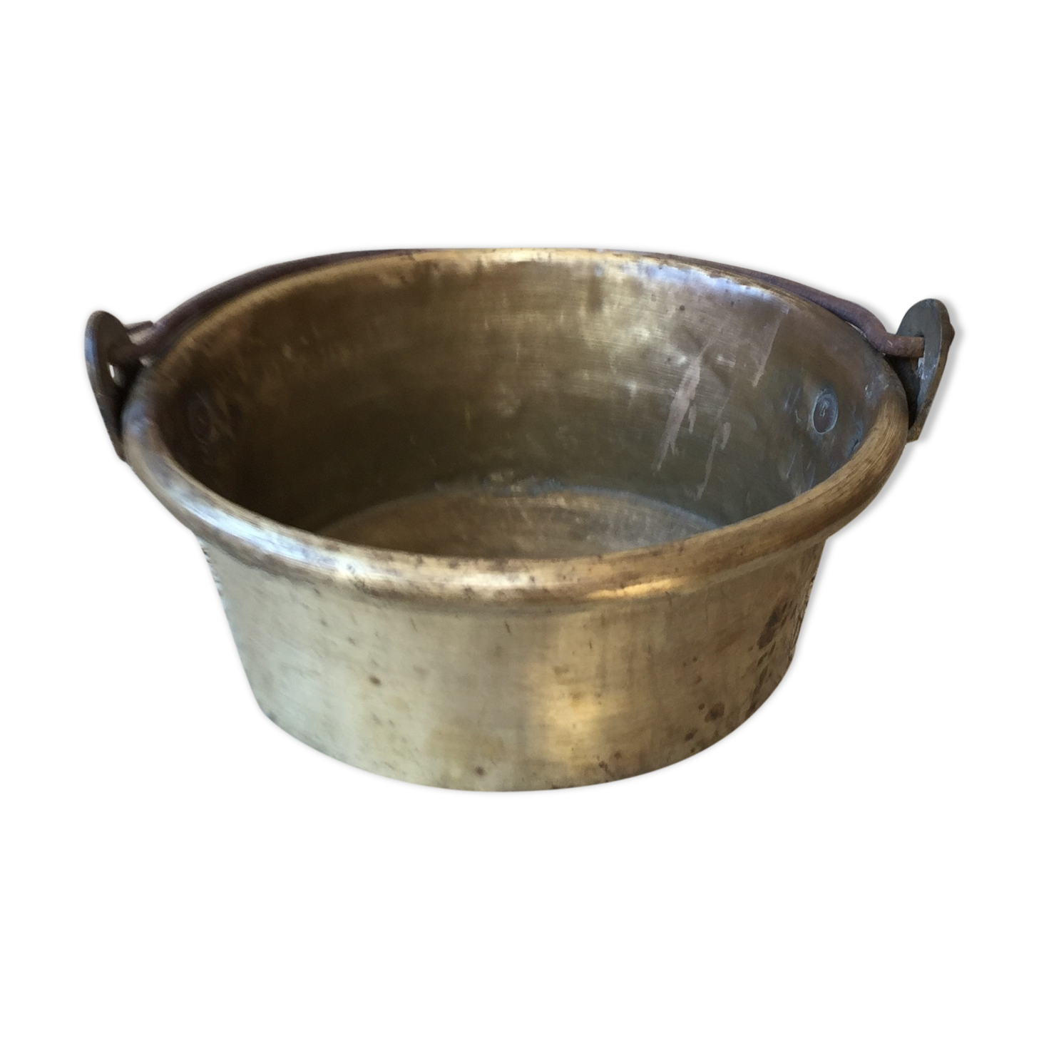 Basin cauldron or old garden in yellow copper