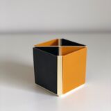 Black and orange plastic compartment pencil pot, 1970