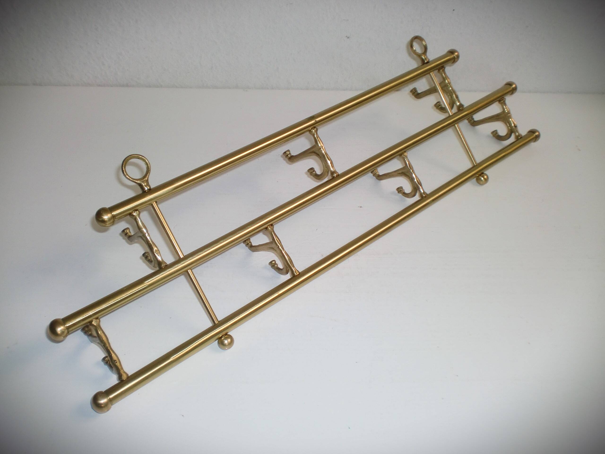 1 of 2 brass coat racks with 7 foldable hooks 1940s art-deco