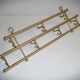 1 of 2 brass coat racks with 7 foldable hooks 1940s art-deco