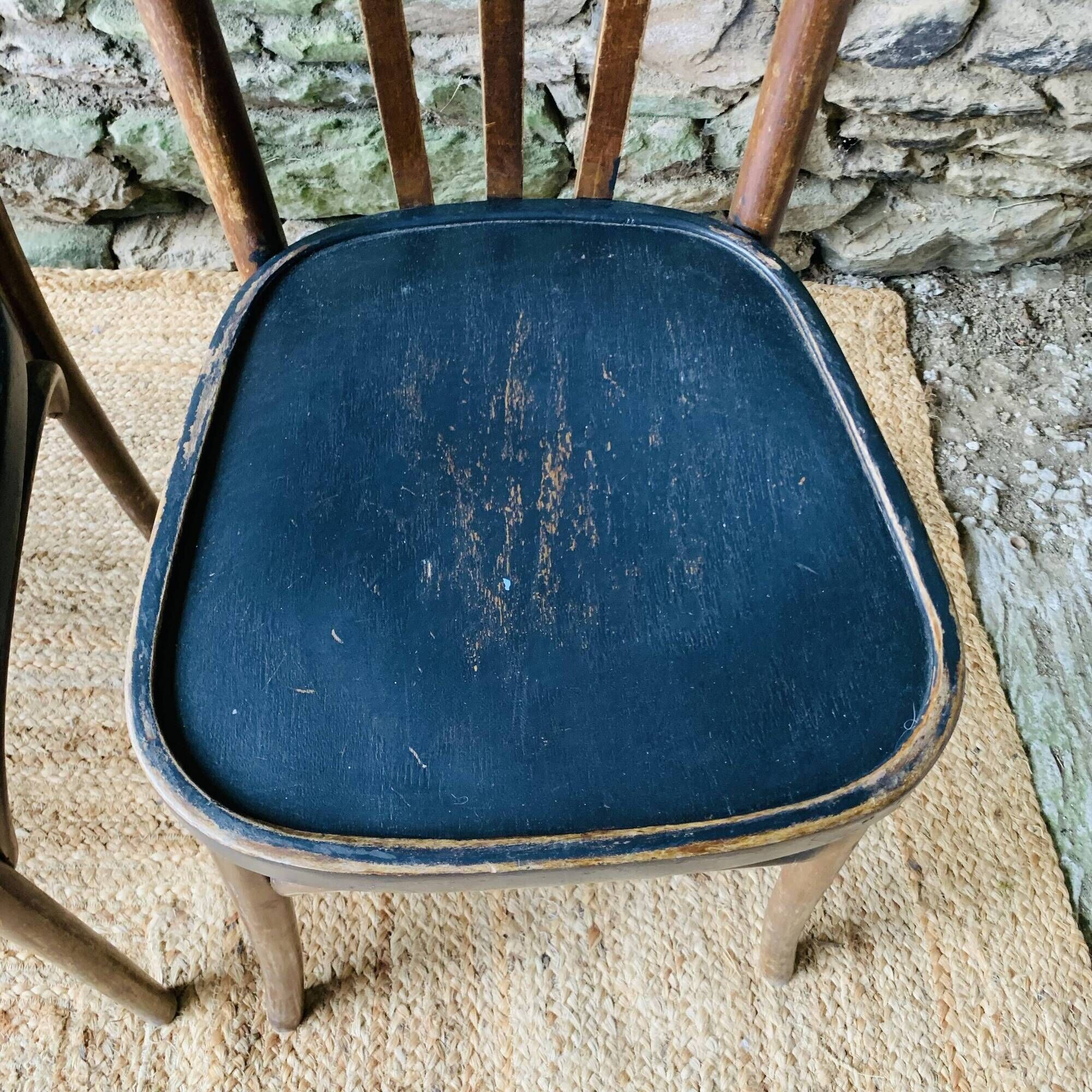Set of four vintage bentwood bistro chairs.