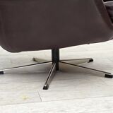 1970s, set of two swivel lounge chairs with footstool, leather.