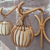 Pair of Louis Sognot rattan wall lights.