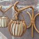 Pair of Louis Sognot rattan wall lights.