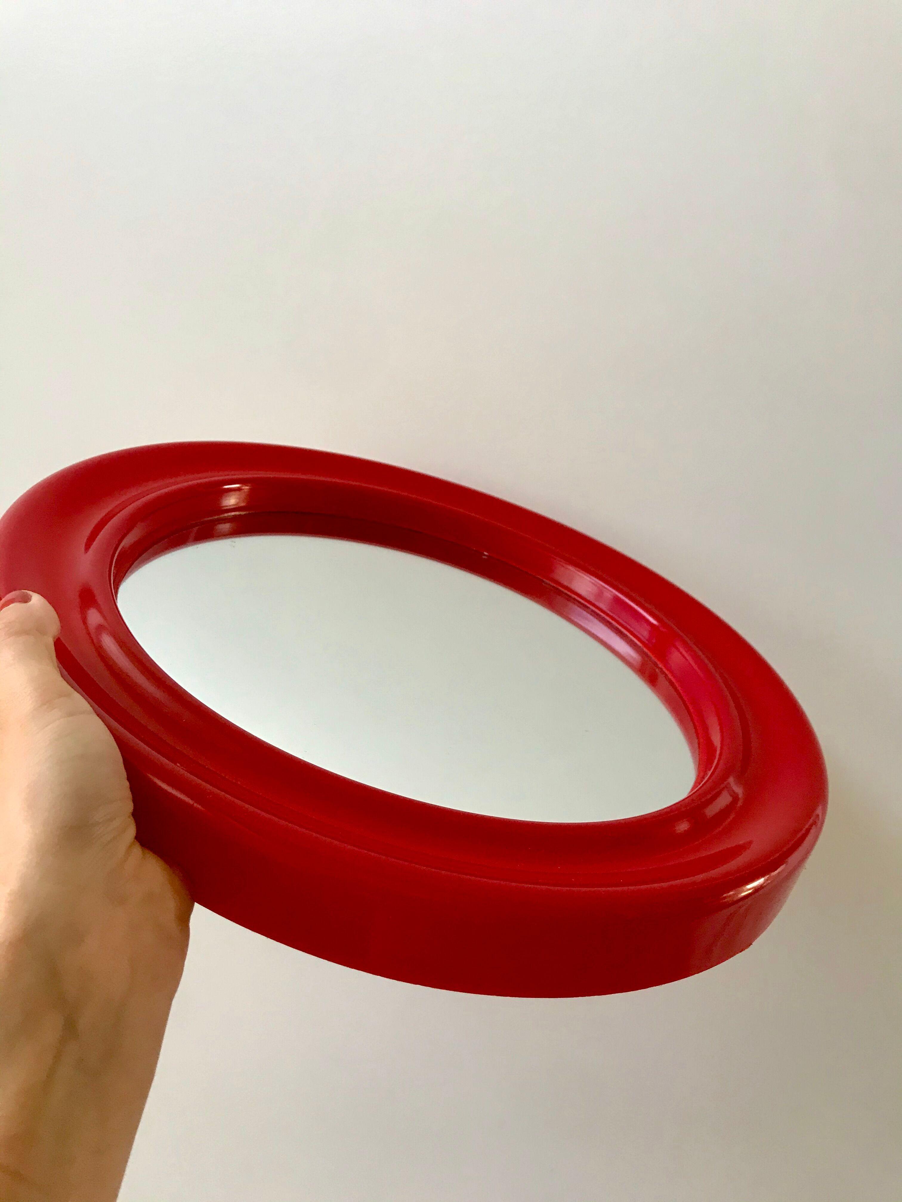 1970s red round plastic mirror