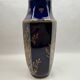 Octagonal vase in Limoges porcelain, oven blue and gold decoration, 20th century
