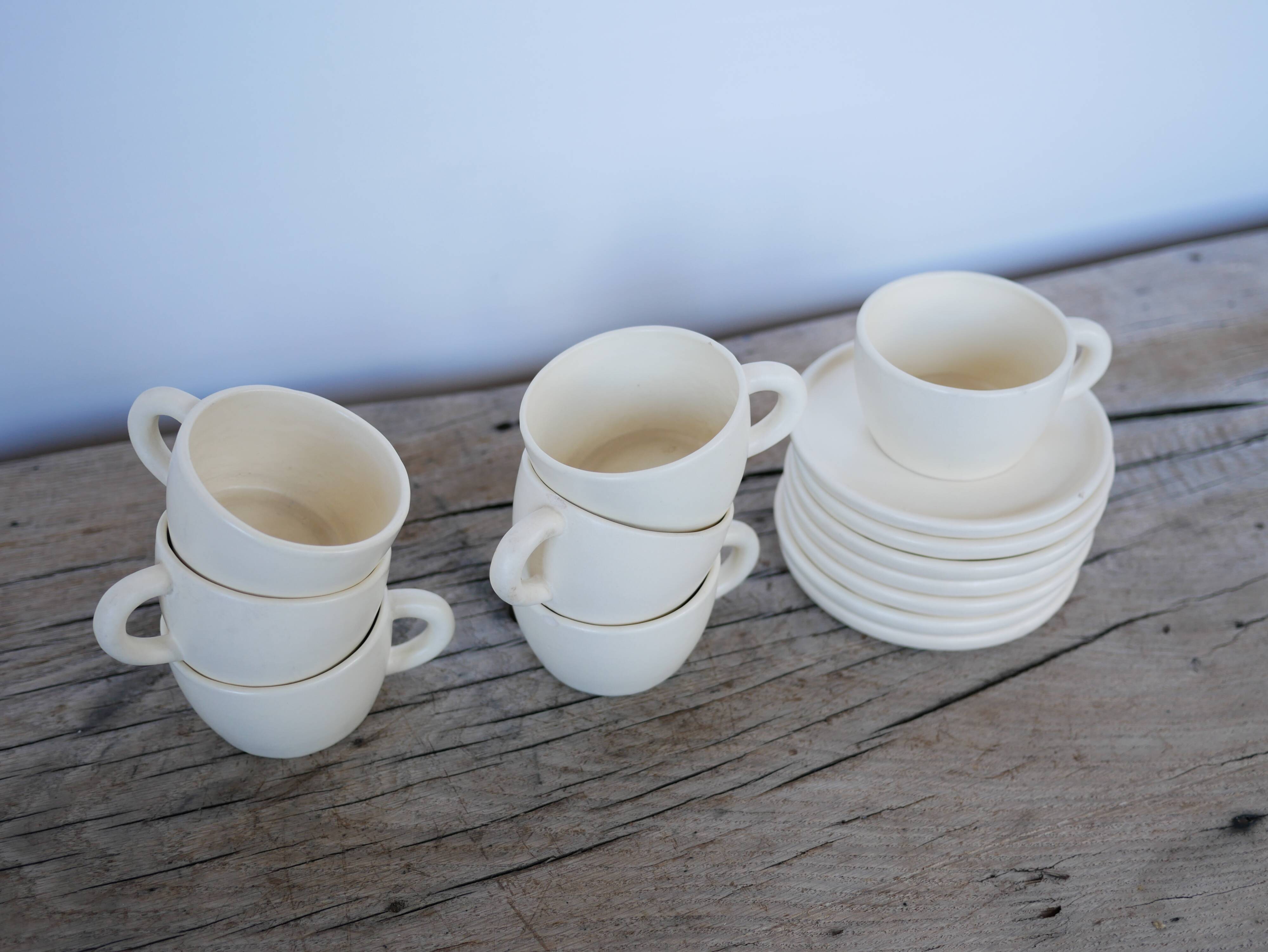 Series of 7 vintage ceramic cups and saucers by Le Pot de Terre