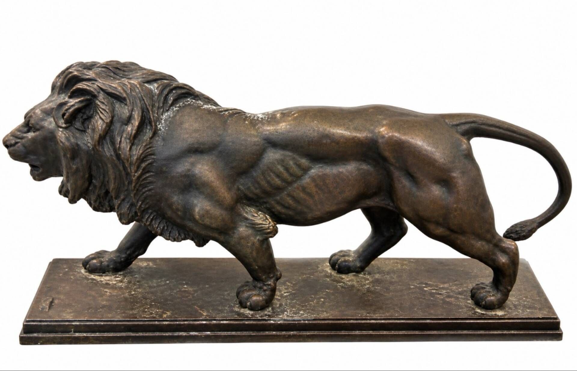 Bronze lion in motion with a brown patina, signed barye.