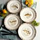 Set of four fish plates. vintage french fish plate set.