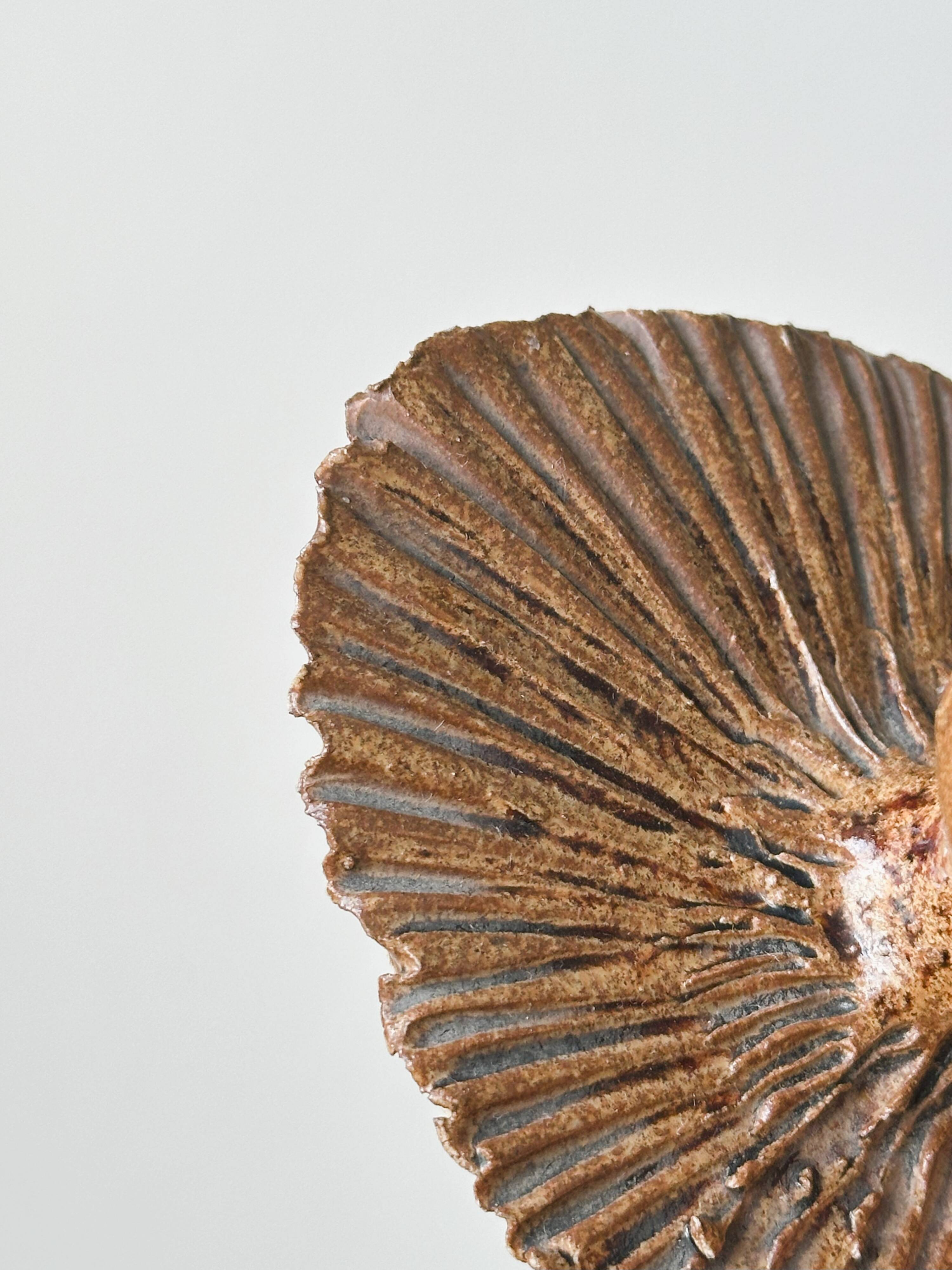 Atypical brown ceramic candle holder