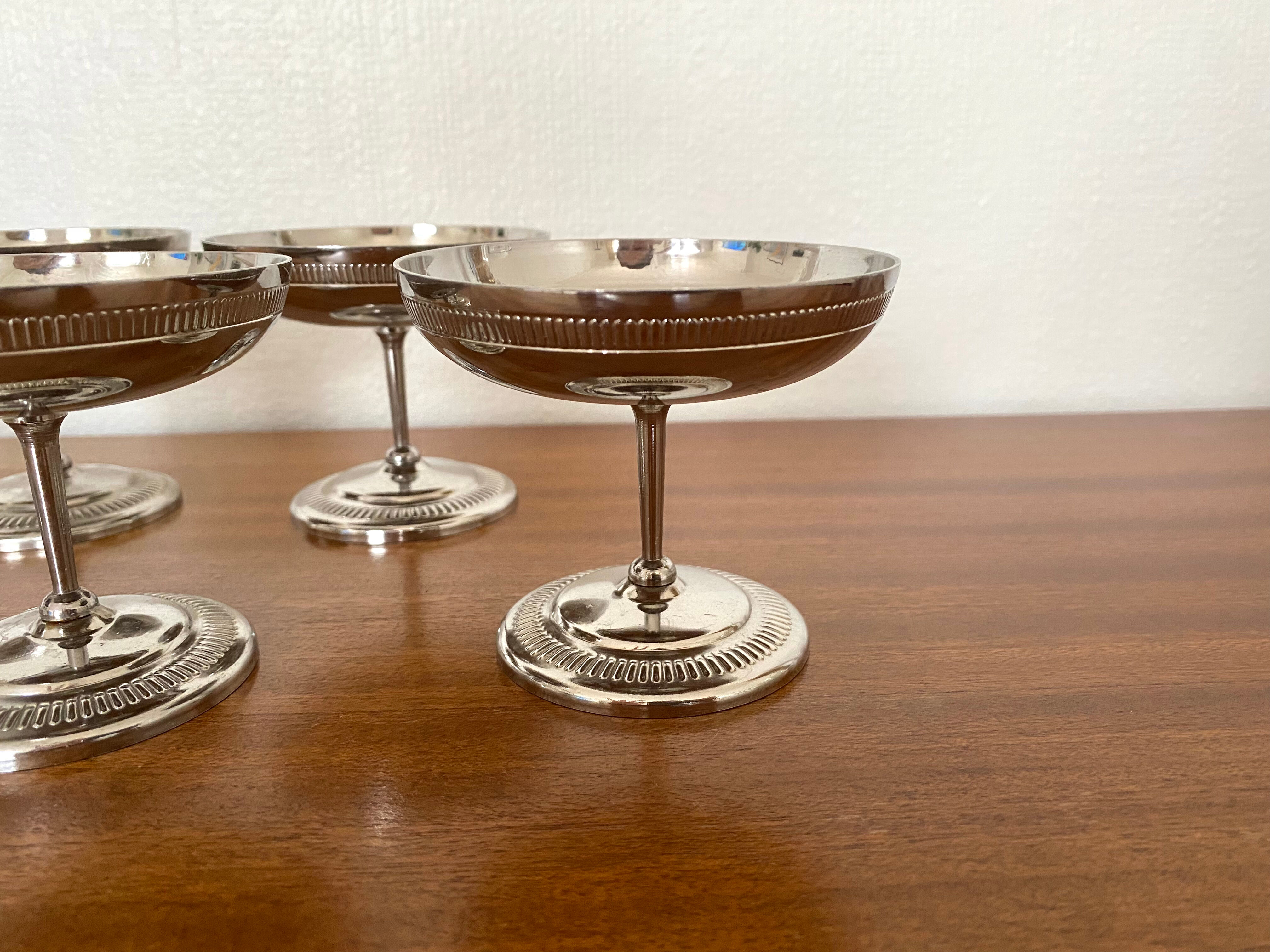 Old silver metal standing ice cups