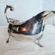 Empire style silver metal sauce boat